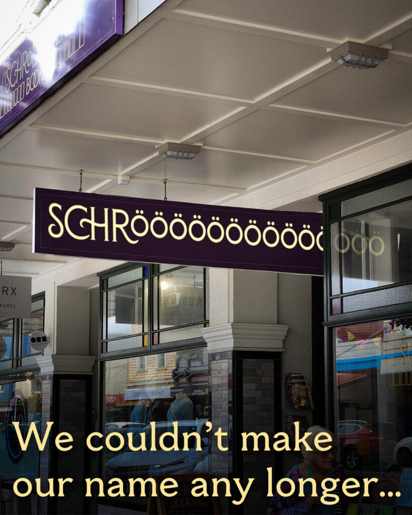 Shop sign edited to be comically long so that it extends into the front door of the shop.
